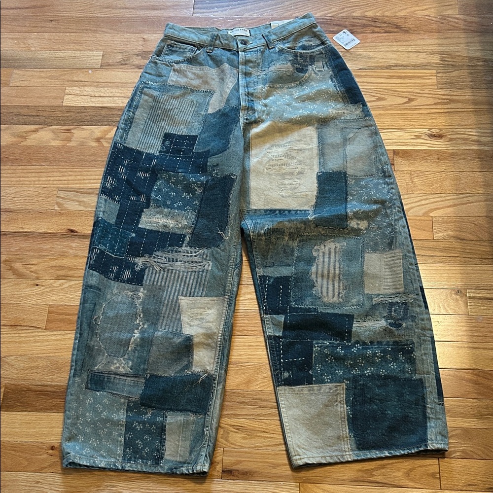 Free People We The Free Illusions Printed Patchwork barrel jeans. NWT. Size 28